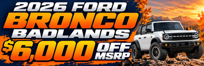 2026 Ford Bronco Badlands featuring $6,000 off MSRP. Shows a white Ford Bronco Badlands with a 'Shop Now' button..